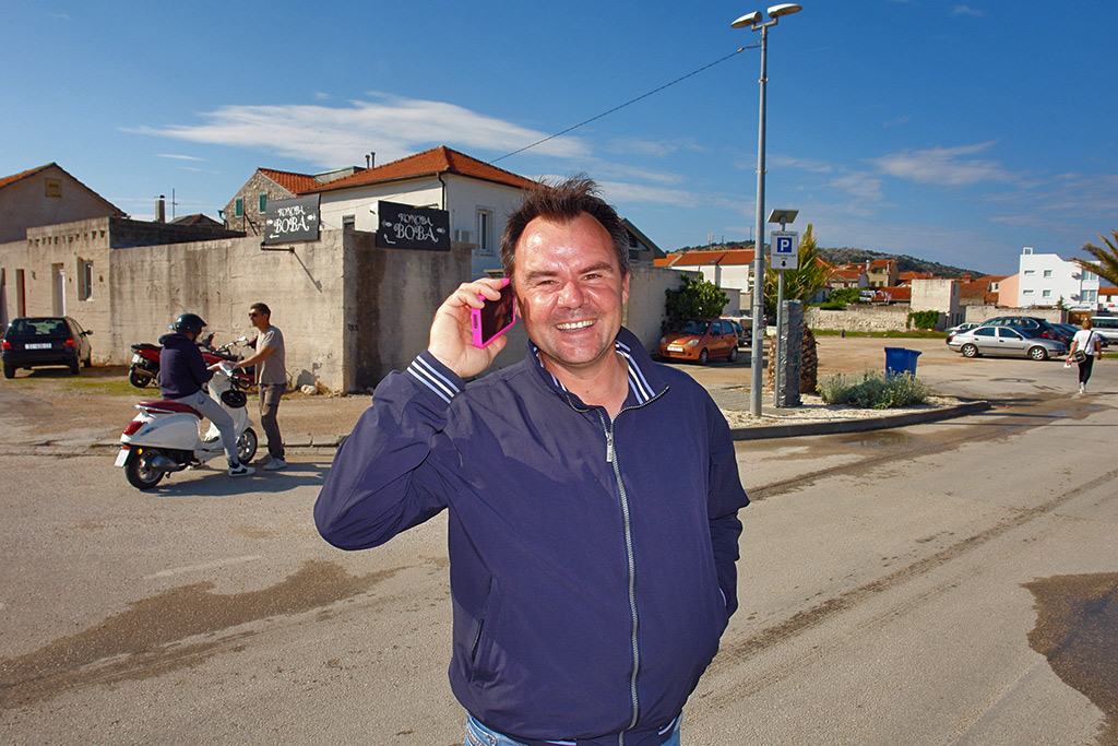 Captain Franko Duić smiling aboard MB Torcida boat in Murter